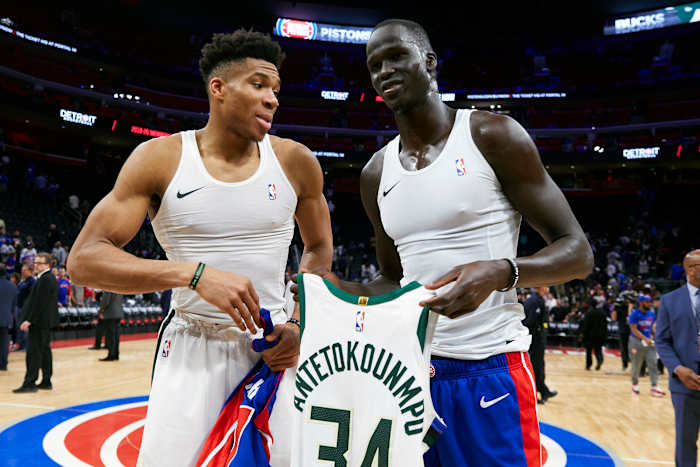 Apr 22, 2019; Detroit, MI, USA; Milwaukee Bucks forward Giannis Antetokounmpo (34) and Detroit Pistons forward Thon Maker (7) exchange jerseys after the game at Little Caesars Arena.